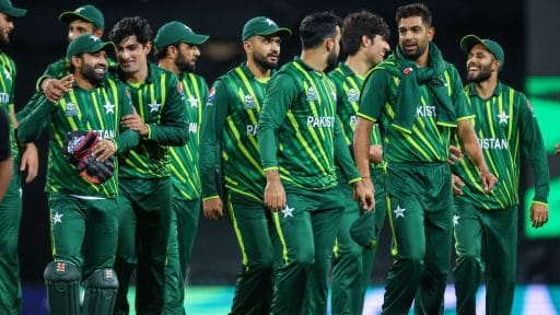 Pakistani cricket team celebrating victory on field.