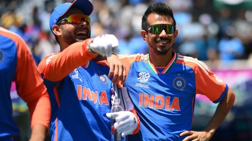 Indian cricketers laughing during a sunny match day.