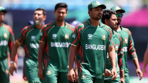 Bangladesh cricket team walking on field in uniforms.