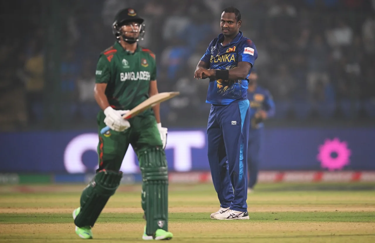 Bangladesh and Sri Lanka cricketers during an intense match.