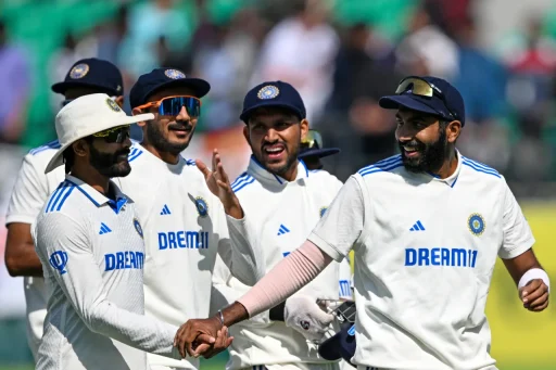 Indian cricketers celebrating victory on field