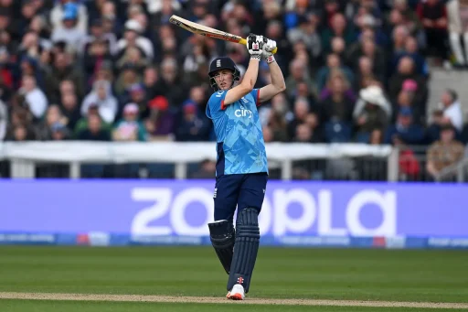 Cricketer playing a shot during a match