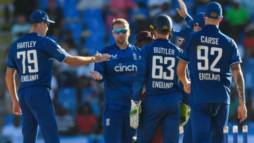 England cricket team strategizing during outdoor match