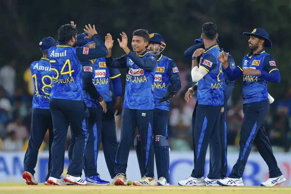 Sri Lankan cricket team celebrating on field