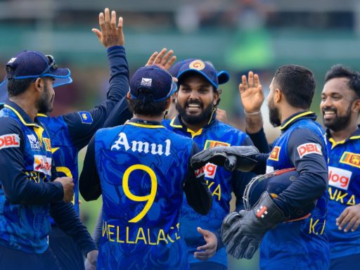 Cricket team celebrating victory on field