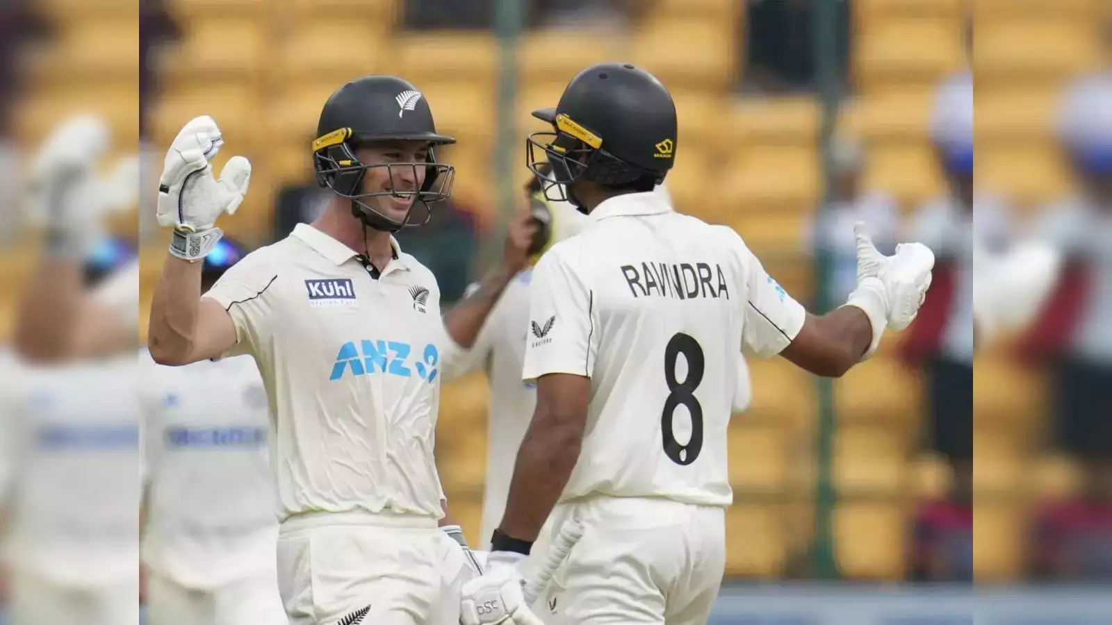 Cricket players celebrating victory on field