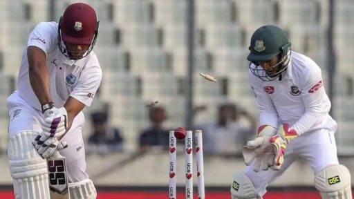 Cricket batsman avoiding bails during a match