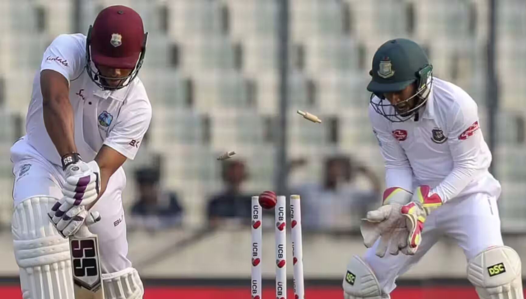 Cricket batsman avoiding bails during a match