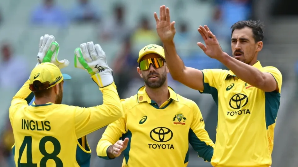 Australian cricketers celebrating during a match