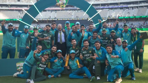 Cricket team celebrating victory at stadium