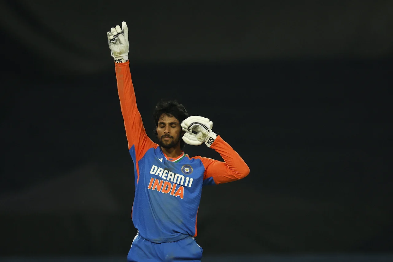 Indian cricketer celebrates victory at night match