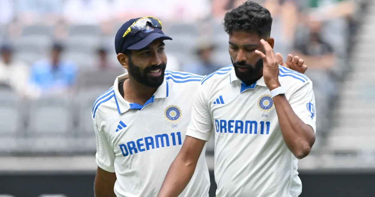 Two cricketers discussing tactics on field