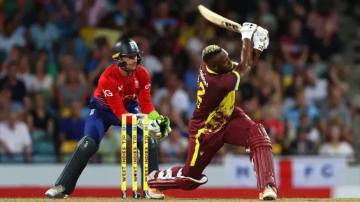 Cricket batsman hitting ball during international match