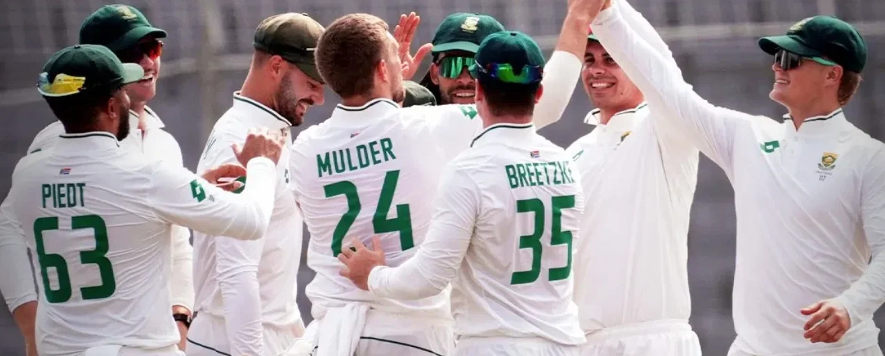 South African cricket team celebrating on field