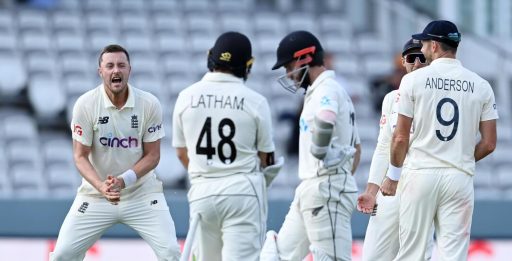 Cricketer exults during a test match against opponents