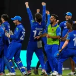 Afghanistan cricket team celebrating victory at night