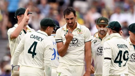 Australian cricketers strategizing during a match