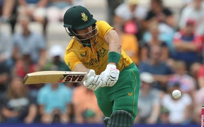 South African cricketer hitting ball during match