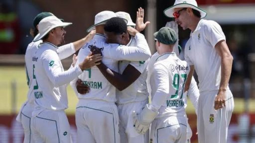 Cricket team celebrates victory on sunny field