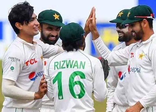 Pakistani cricketers celebrating on the field