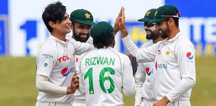 Pakistani cricketers celebrating on the field