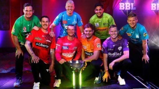 Cricket players from different teams posing with trophy