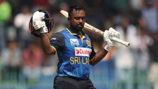 Cricketer in Sri Lanka jersey celebrating a milestone