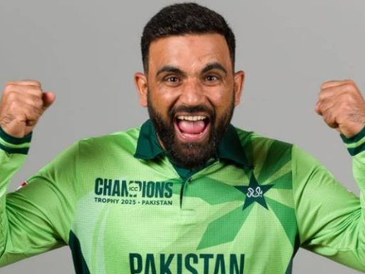 Excited cricketer in Pakistan team jersey celebrating