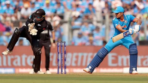 Cricket players in action during international match